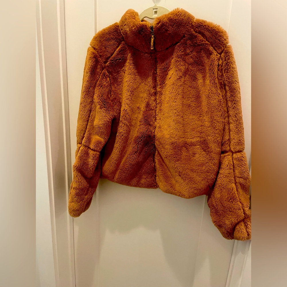 Patagonia Teddy zip up fur coat.